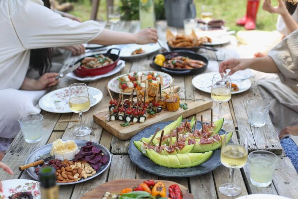 A delicious dinner party is shown.